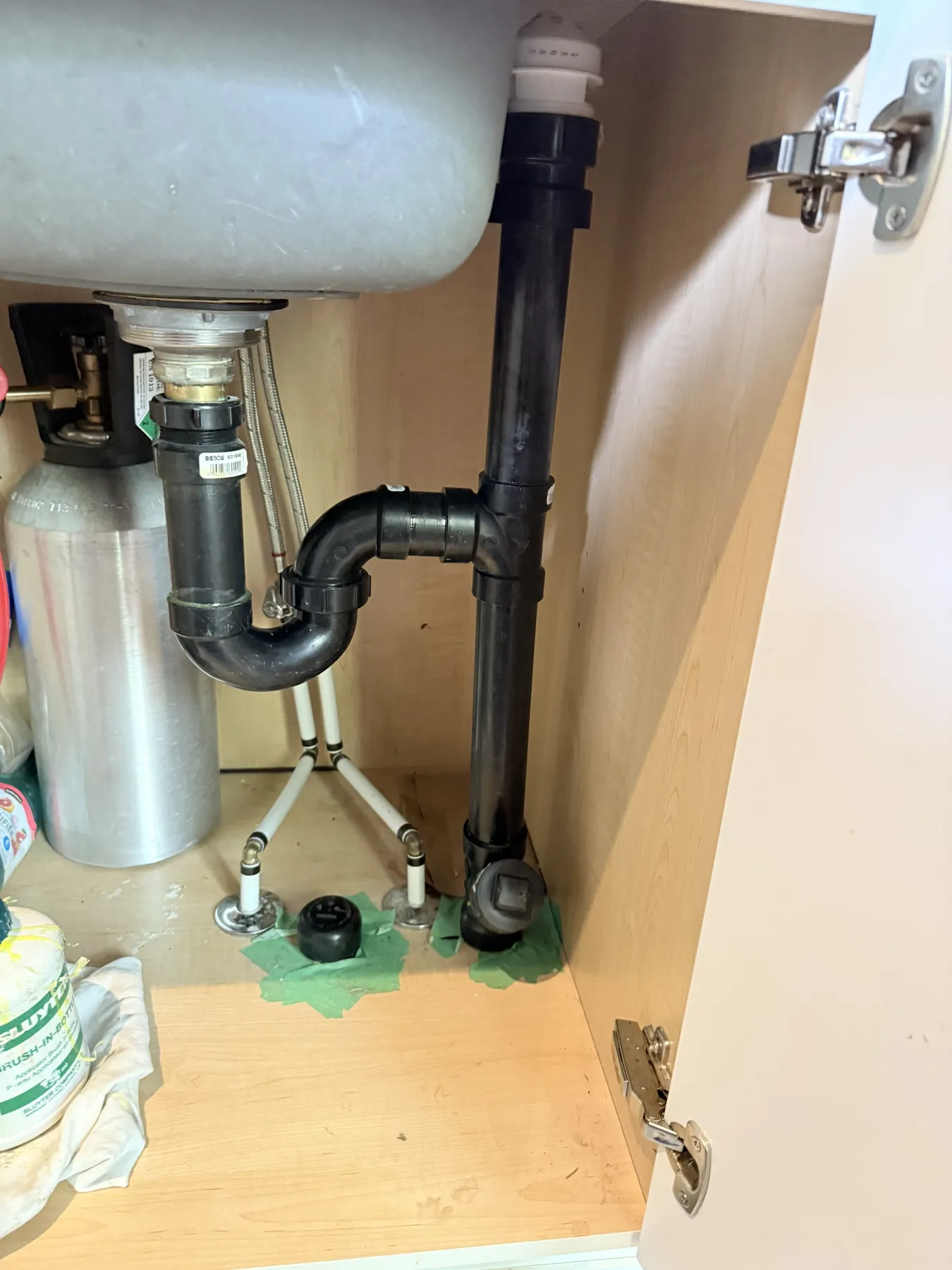 Kitchen sink ABS drain and dishwasher plumbing installation in Ottawa.
